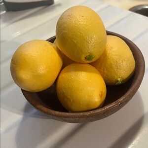 Fresh Yellow Lemons in Wooden Bowl